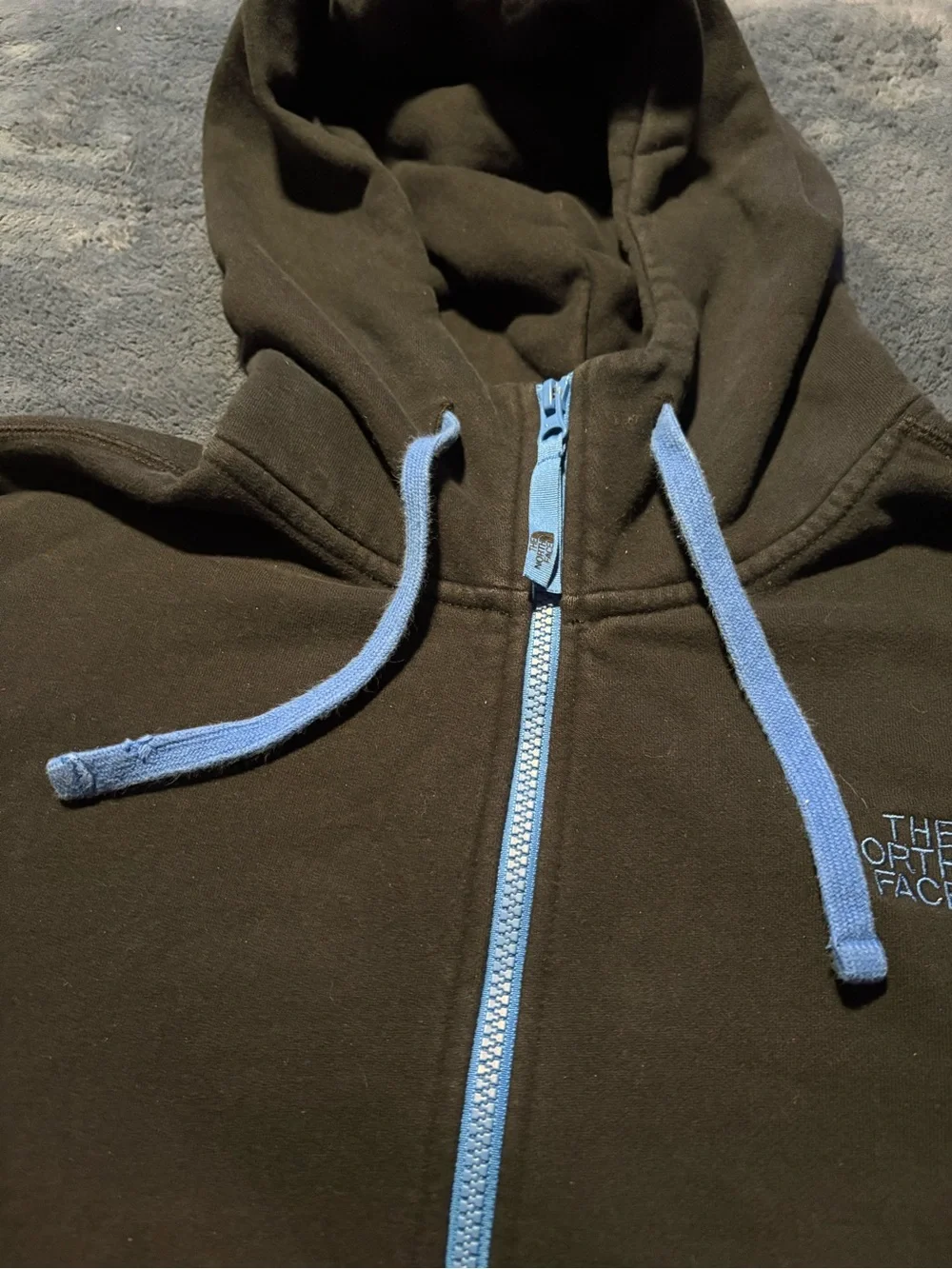 The North Face Black Hoodie with Light Blue Trim